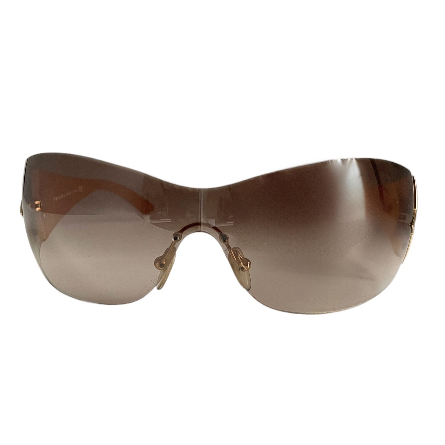 Prada Star Shield Wraparound Sunglasses in Gold – Nitryl