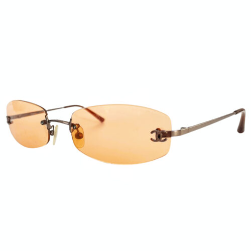 Vintage Chanel Rimless Oval Sunglasses in Orange | NITRYL