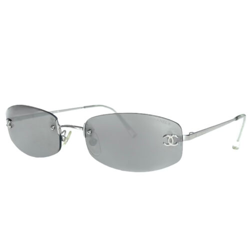 Vintage Chanel Rimless Oval Sunglasses in Mirrored Silver | NITRYL